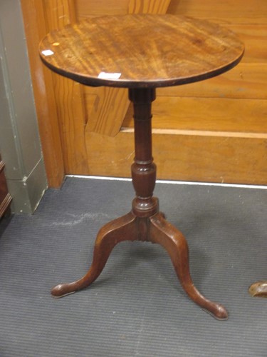 Lot 380 - A George III mahogany circular table, 70 x 45...