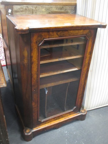 Lot 390 - A late 19th century walnut music cabinet, with...