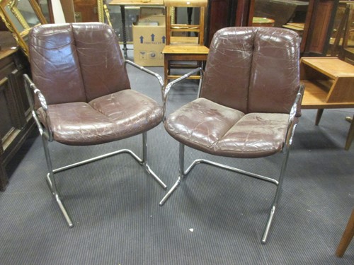 Lot 299 - A set of six brown leather and tubular chrome...