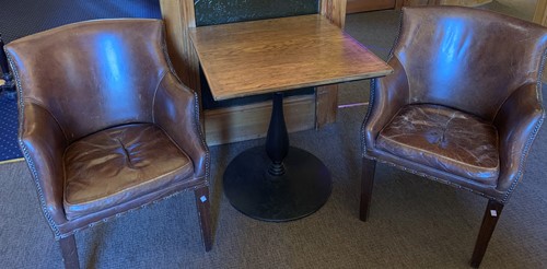 Lot 575 - Four leather compact club armchairs