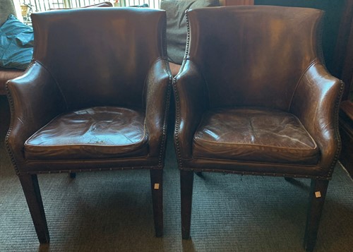 Lot 575 - Four leather compact club armchairs