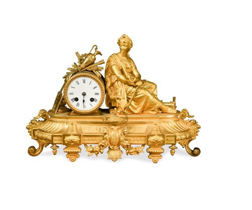 Lot 432 - A French Louis XVI style gilt metal mantel clock