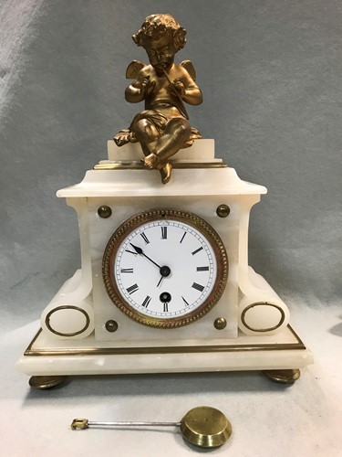 Lot 11 - A French late 19th century gilt metal and alabaster timepiece