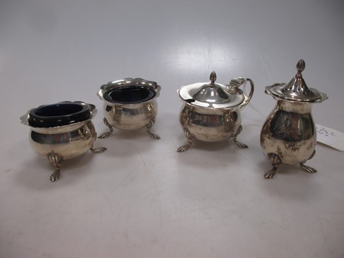 Lot 170 - A matched four piece silver cruet set with...