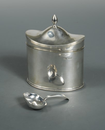 Lot 599 - A George V silver tea caddy and caddy spoon