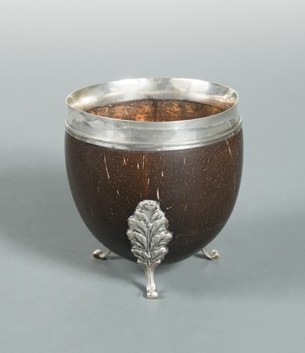 Lot 541 - A William IV silver mounted coconut standing cup