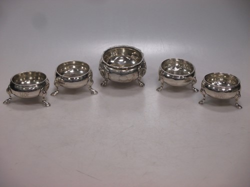 Lot 172 - Two pairs of silver cauldron salts together...