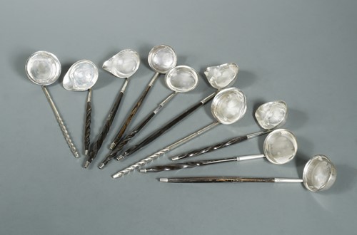 Lot 491 - Four pairs of Georgian silver toddy ladles together with a Victorian pair
