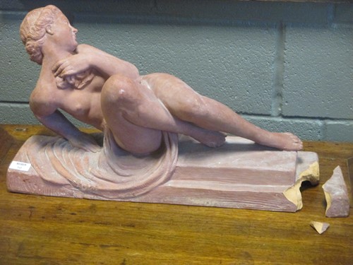 Lot 50 - A terracotta figure