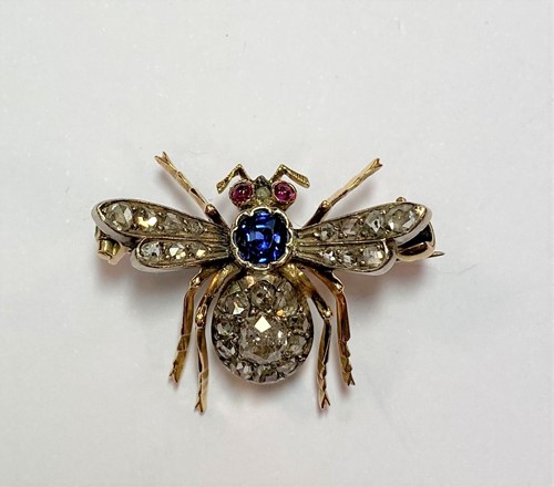 Lot 174 - A diamond, sapphire and ruby set insect brooch