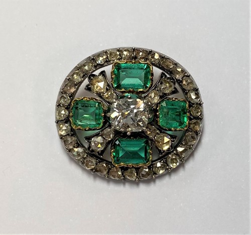 Lot 158 - A 19th Century emerald and diamond brooch