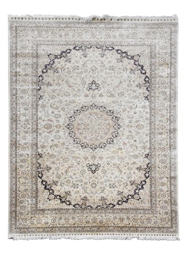 Lot 515 - A large Hereke silk carpet