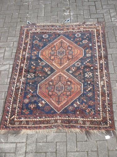 Lot 551 - A North West Persian style carpet.