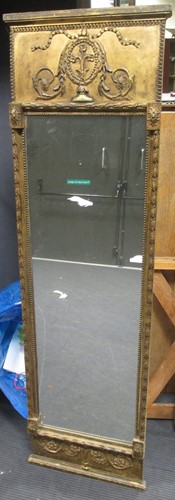Lot 692 - A 19th century gilt and gesso pier glass