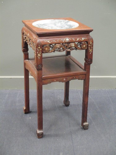 Lot 383 - A Chinese hardwood jardinière table with...