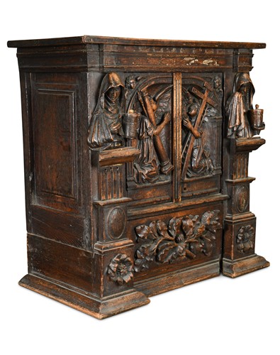 Lot 483 - A North European carved oak cabinet of small proportions, late 17th or early 18th century