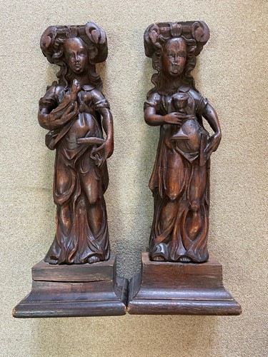 Lot 468 - A pair of carved oak caryatids, probably 17th century