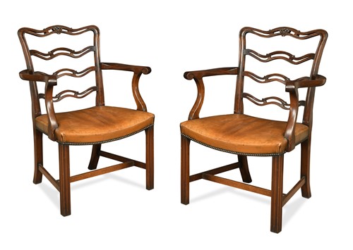 Lot 549 - A pair of Chippendale style mahogany elbow chairs, late 19th century