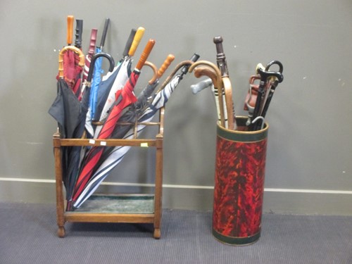 Lot 488 - A brass stick stand, a wooden stick stand, and...