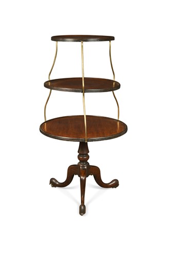 Lot 555 - A mahogany three tier dumb waiter