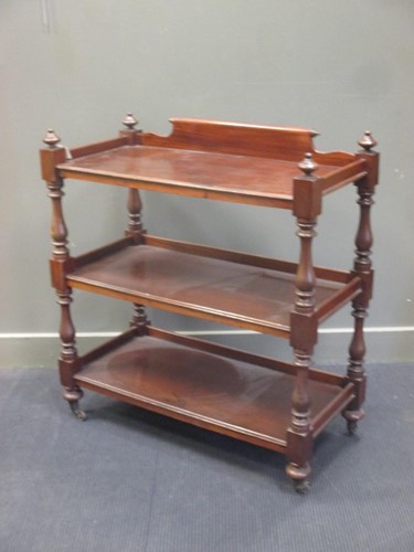 Lot 438 - A late Victorian mahogany three tier buffet on...