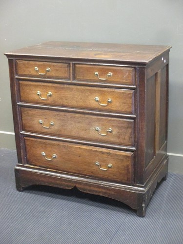Lot 459 - An 18th century oak chest of drawers on plinth...