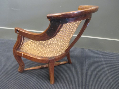 Lot 386 - A 19th century bergere child's armchair 49cm high