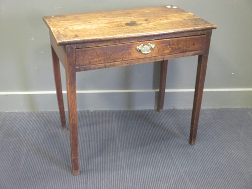 Lot 411 - A George III elm side table with frieze drawer...