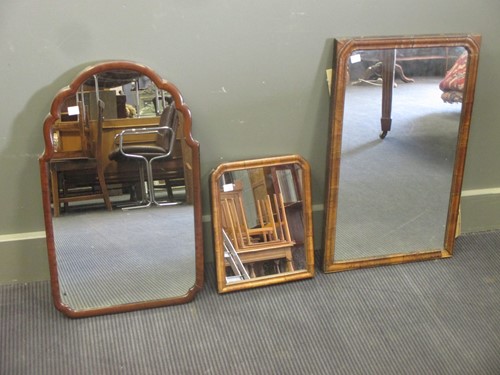 Lot 475 - An 18th century walnut cushion framed mirror...
