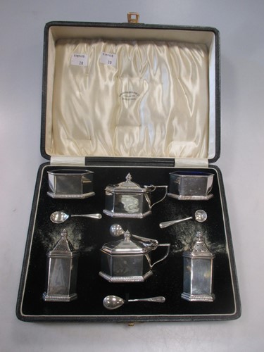 Lot 177 - A cased silver six piece cruet set by Manoah...