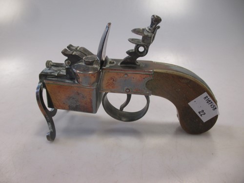 Lot 112 - A Dunhill tinder pistol table lighter