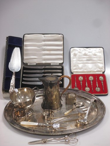 Lot 178 - A Chester silver trophy cup, silver napkin...