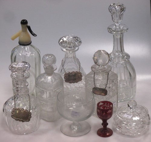 Lot 35 - A collection of glass decanters, some with...