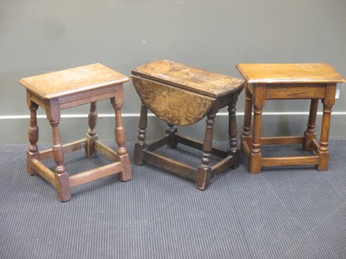 Lot 462 - A group of three oak joint stools of similar...