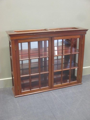 Lot 373 - A mahogany table top two door shop display cabinet