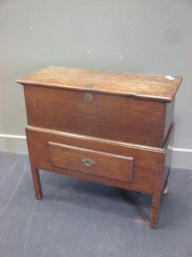 Lot 461 - An 18th century elm coffer on stand with...