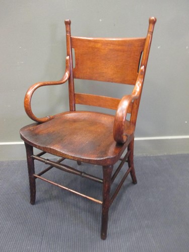 Lot 352 - An Arts & Crafts oak desk chair
