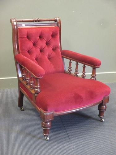 Lot 440 - A Victorian mahogany button back armchair with...