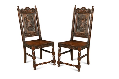 Lot 499 - Six carved oak chairs in the 18th century...