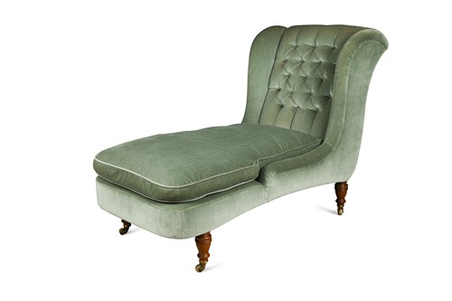 Lot 540 - A Howard & Sons upholstered wing back day bed
