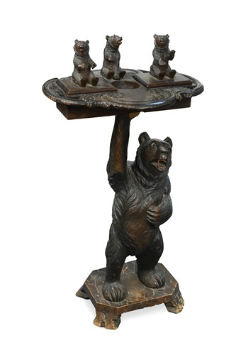 Lot 590 - A Black Forest carved bear smoker's stand