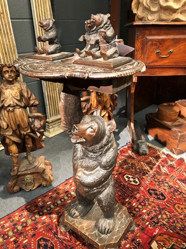Lot 590 - A Black Forest carved bear smoker's stand