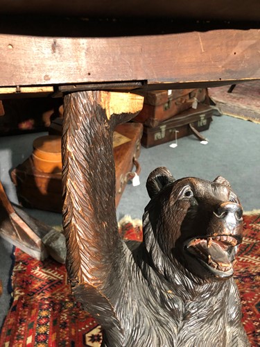 Lot 590 - A Black Forest carved bear smoker's stand