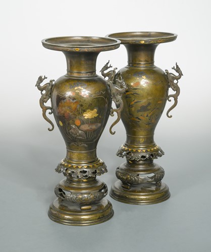 Lot 167 - A pair of Japanese bronze and mixed metal inlaid pedestal vases, Meiji Period (1868-1912)
