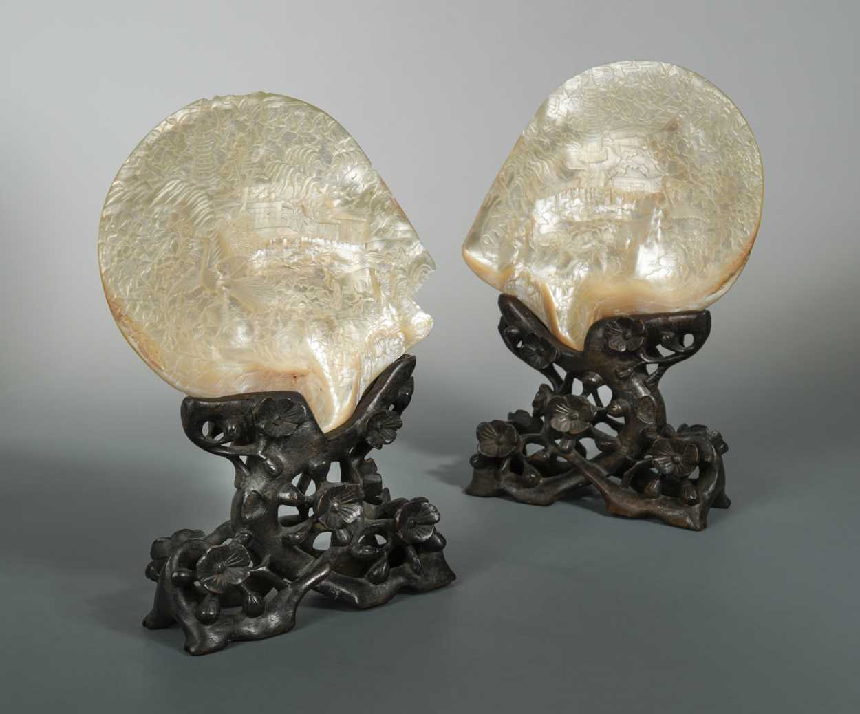 Lot 155 - A pair of Chinese carved abalone shells on stands, 19th century