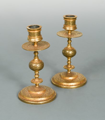 Lot 361 - A pair of Toledo Ware candlesticks, probably 19th century