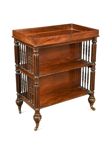 Lot 560 - A Regency mahogany double sided open bookcase in the manner of Gillows
