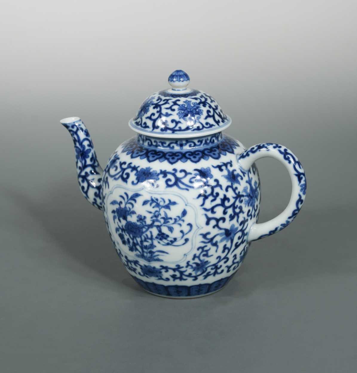 Lot 69 - A Chinese blue and white porcelain teapot and cover, Qianlong seal mark but later