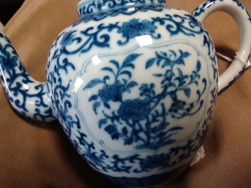 Lot 69 - A Chinese blue and white porcelain teapot and cover, Qianlong seal mark but later