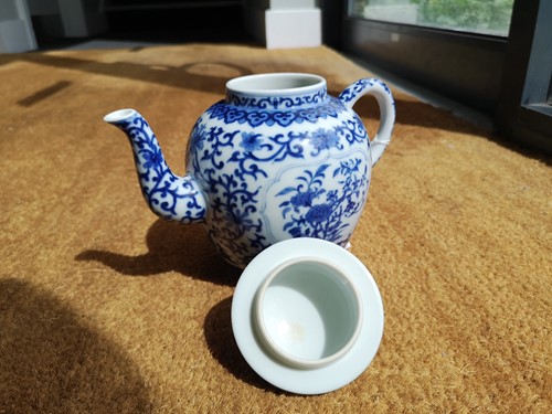 Lot 69 - A Chinese blue and white porcelain teapot and cover, Qianlong seal mark but later